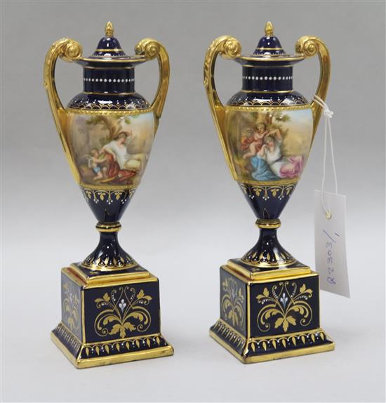 A pair of Vienna blue ground vases